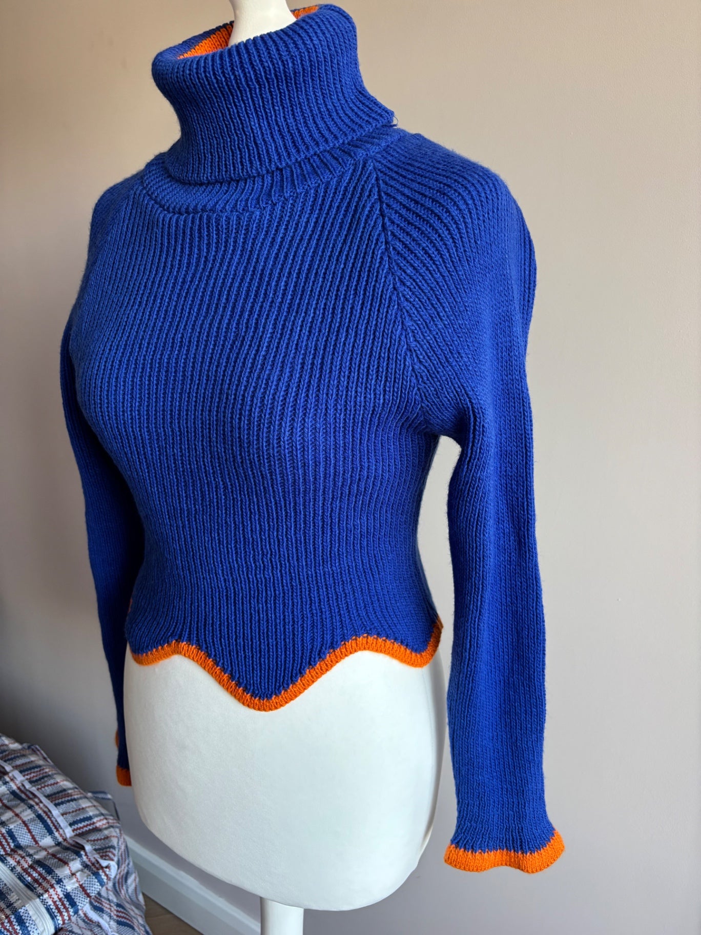 Blue and orange turtle neck sweater