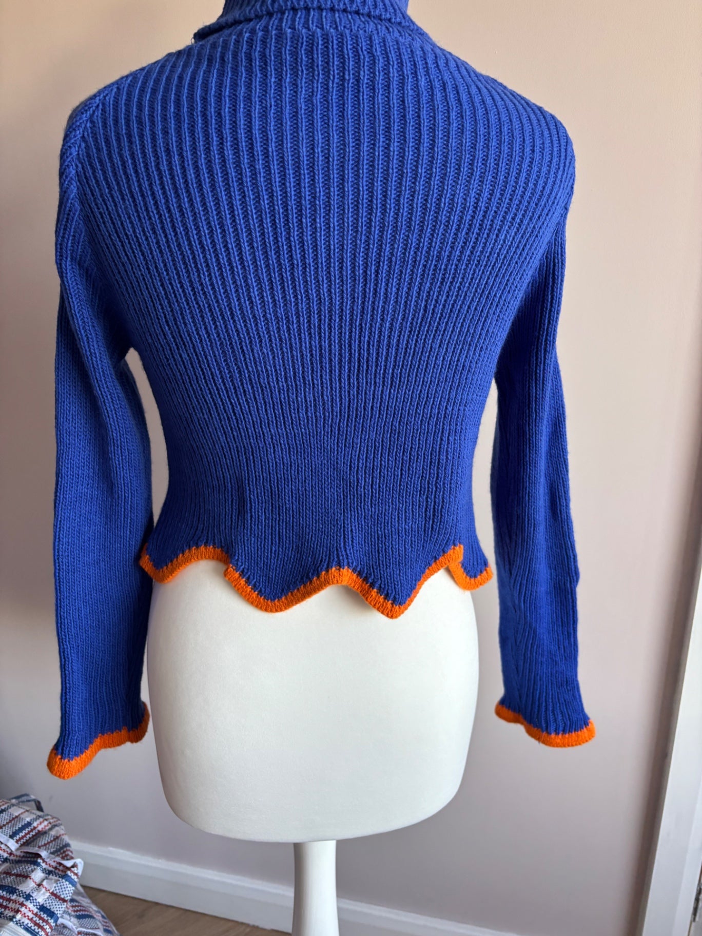 Blue and orange turtle neck sweater