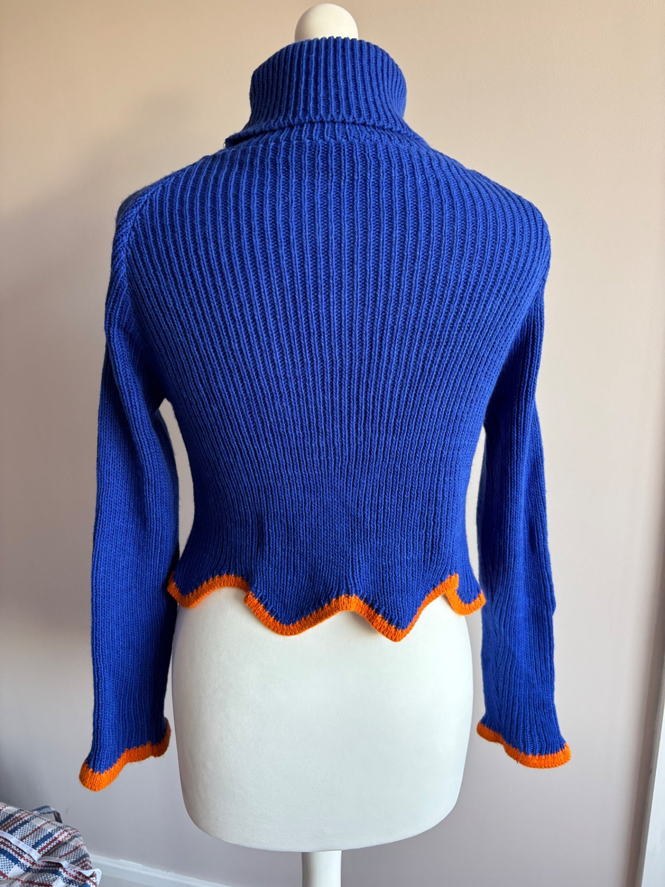 Blue and orange turtle neck sweater