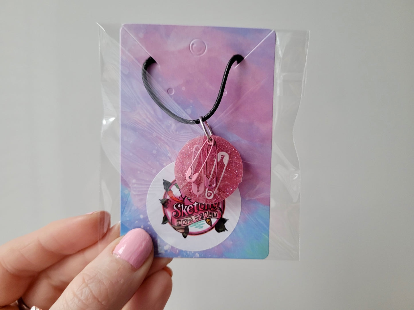 Pink Glitter Safety Pin Circle Pendant Necklace - 50 + 5cm Black Cord