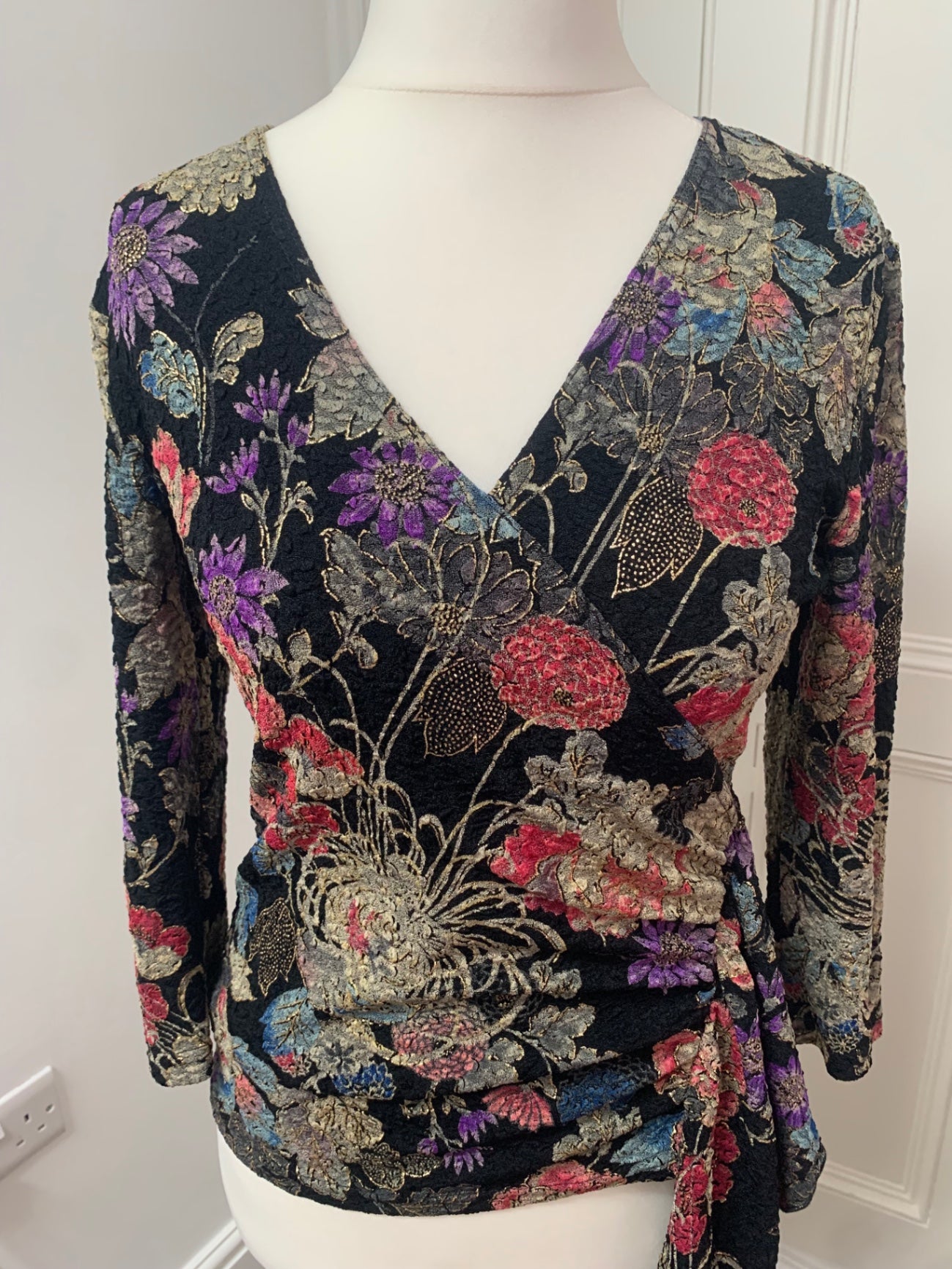 vintage black top with multicoloured flowers 