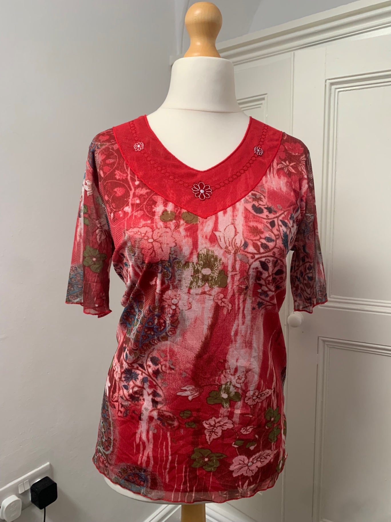 red floral top