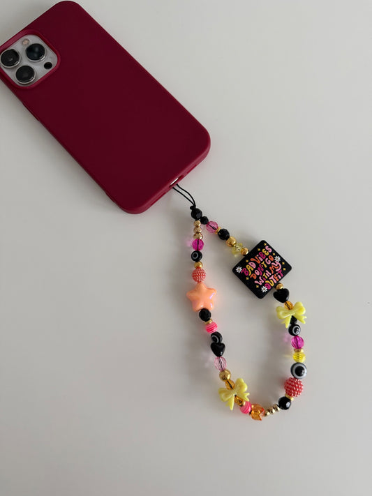 ‘Bad vibes don’t go with my outfit’ phone charm