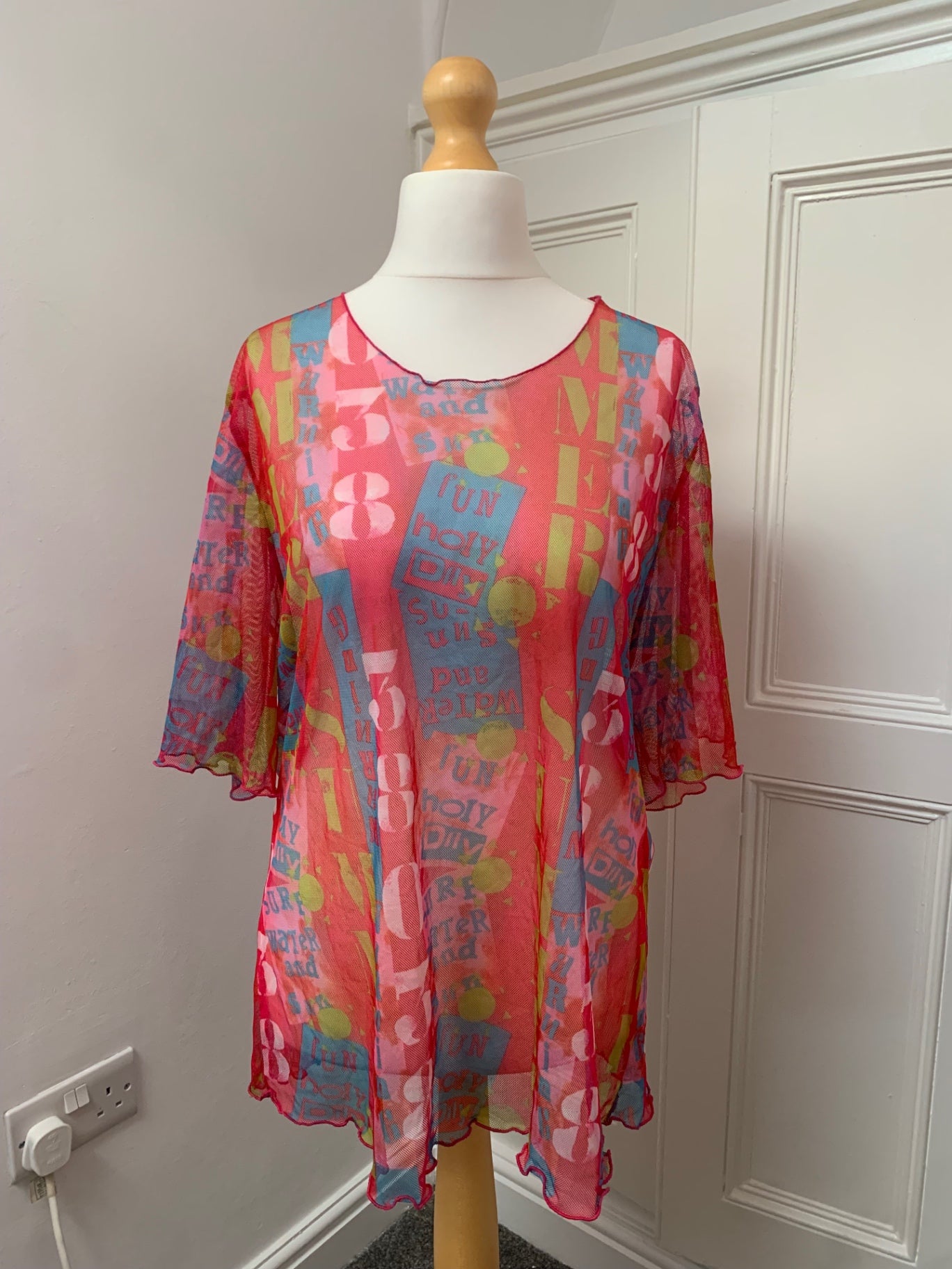 colourful graphic mesh top