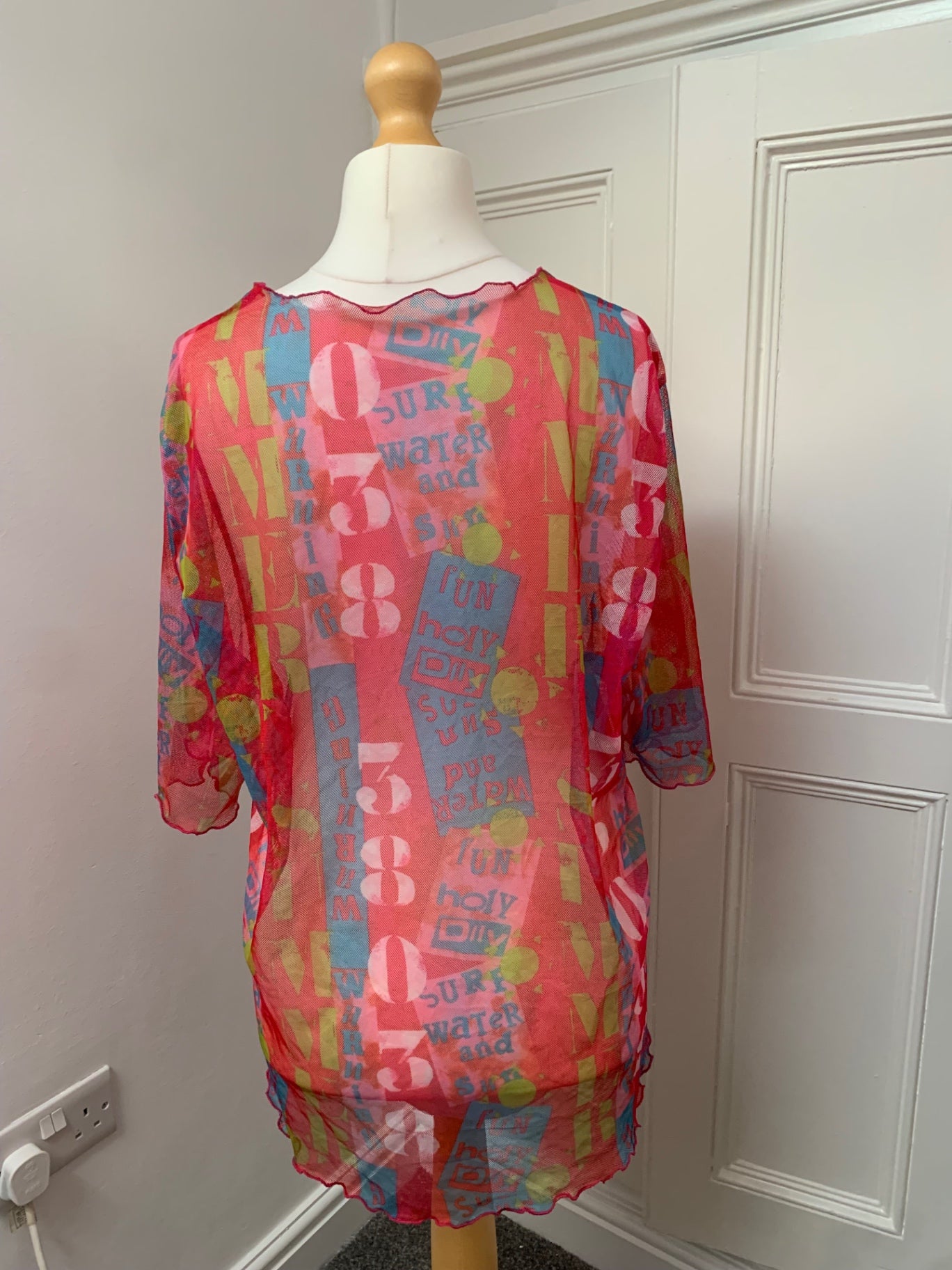 colourful graphic mesh top