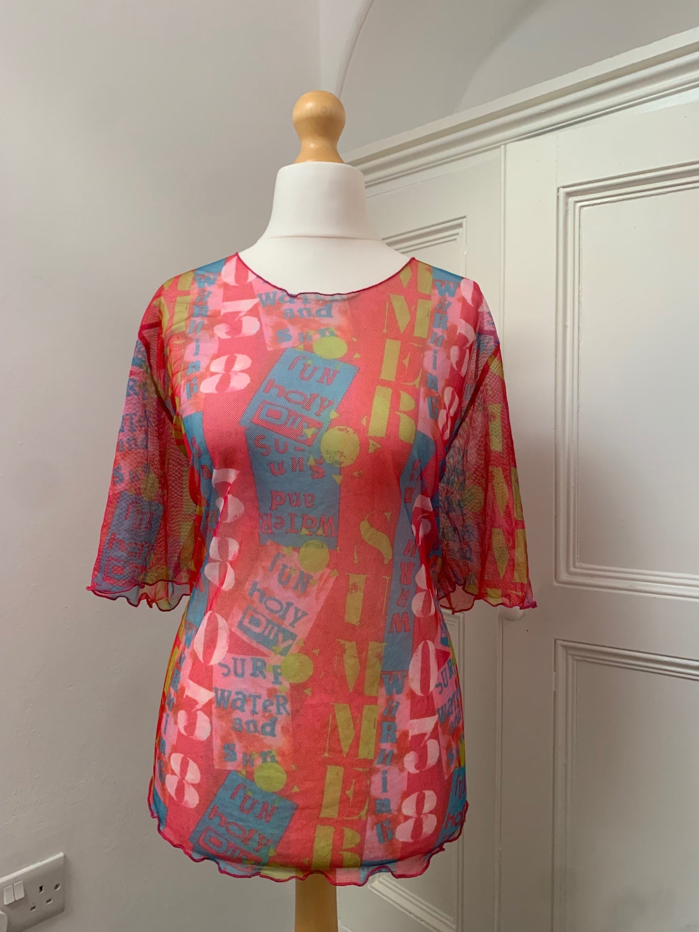 colourful graphic mesh top