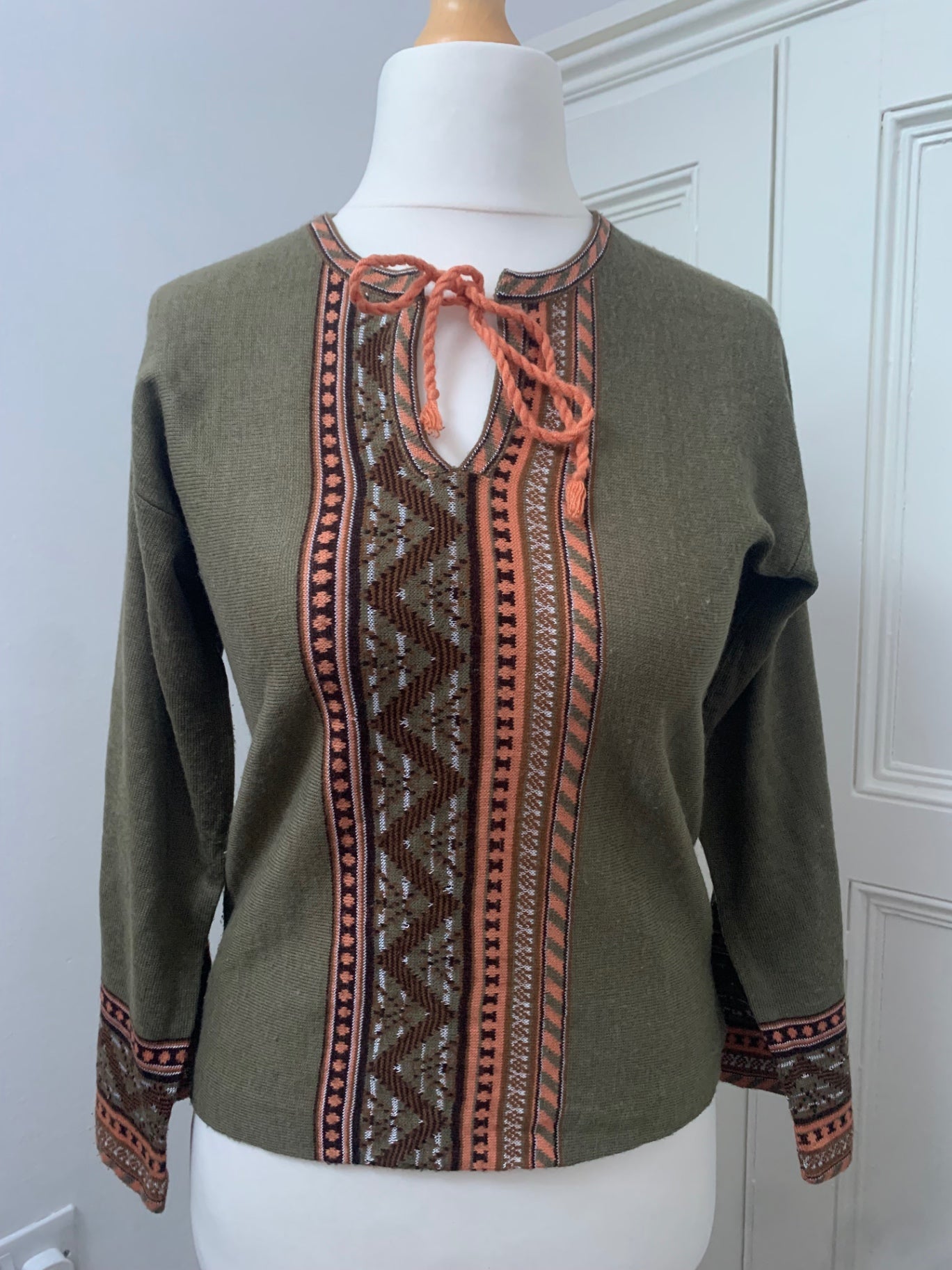 green embroidered knit jumper