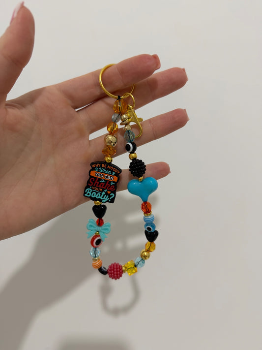 ‘Shake your booty’ Keyring - gold 