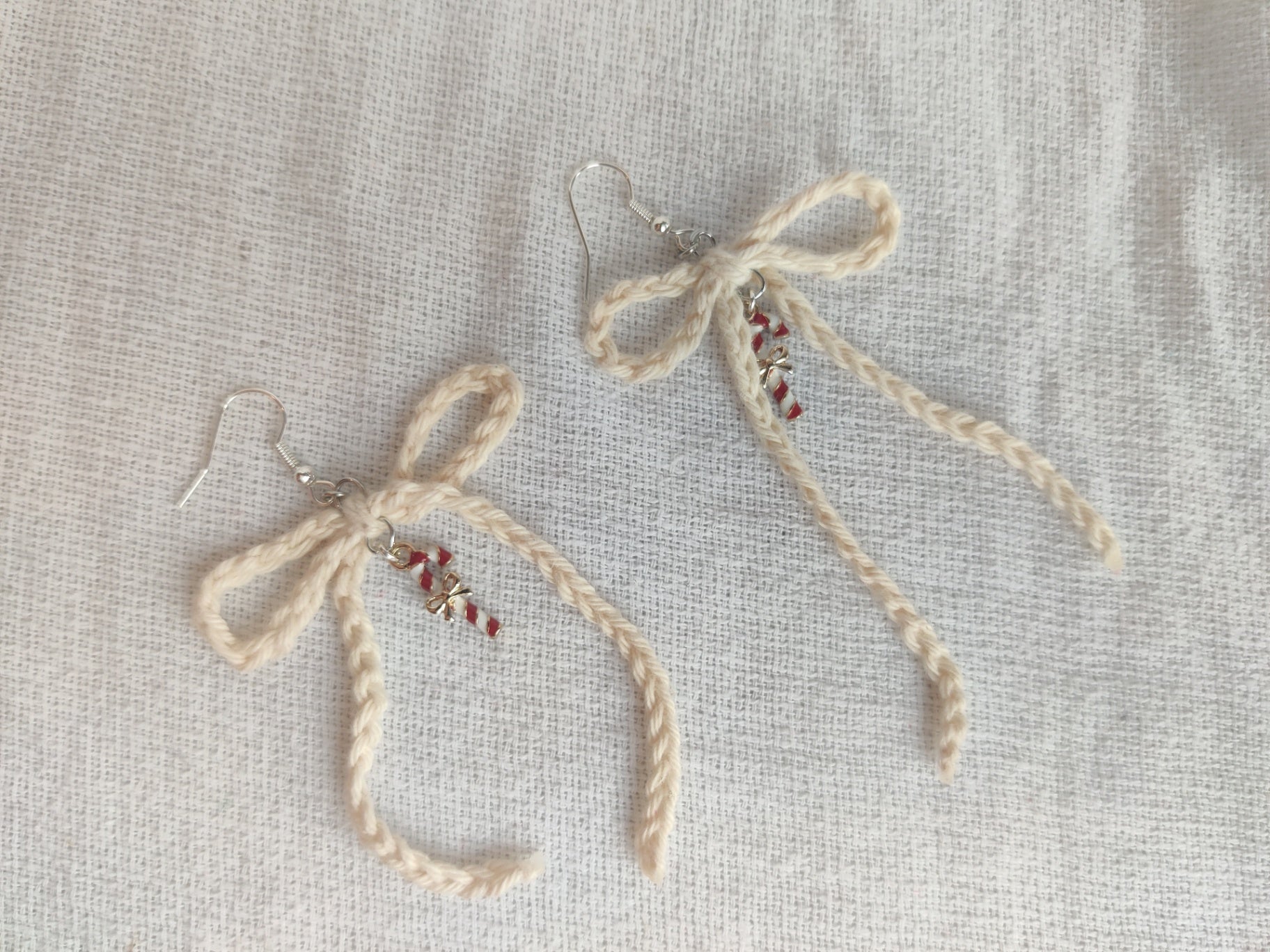 Crochet Christmas earrings, white bows, candy cane charms