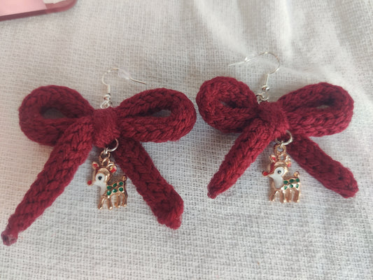 Crochet burgundy bow earrings with reindeer charms