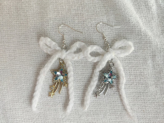 White crochet bows with sparkly star charms