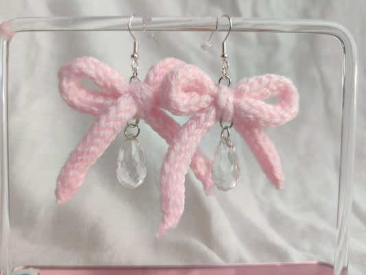 Crochet light pink bow earrings with raindrop bead charm
