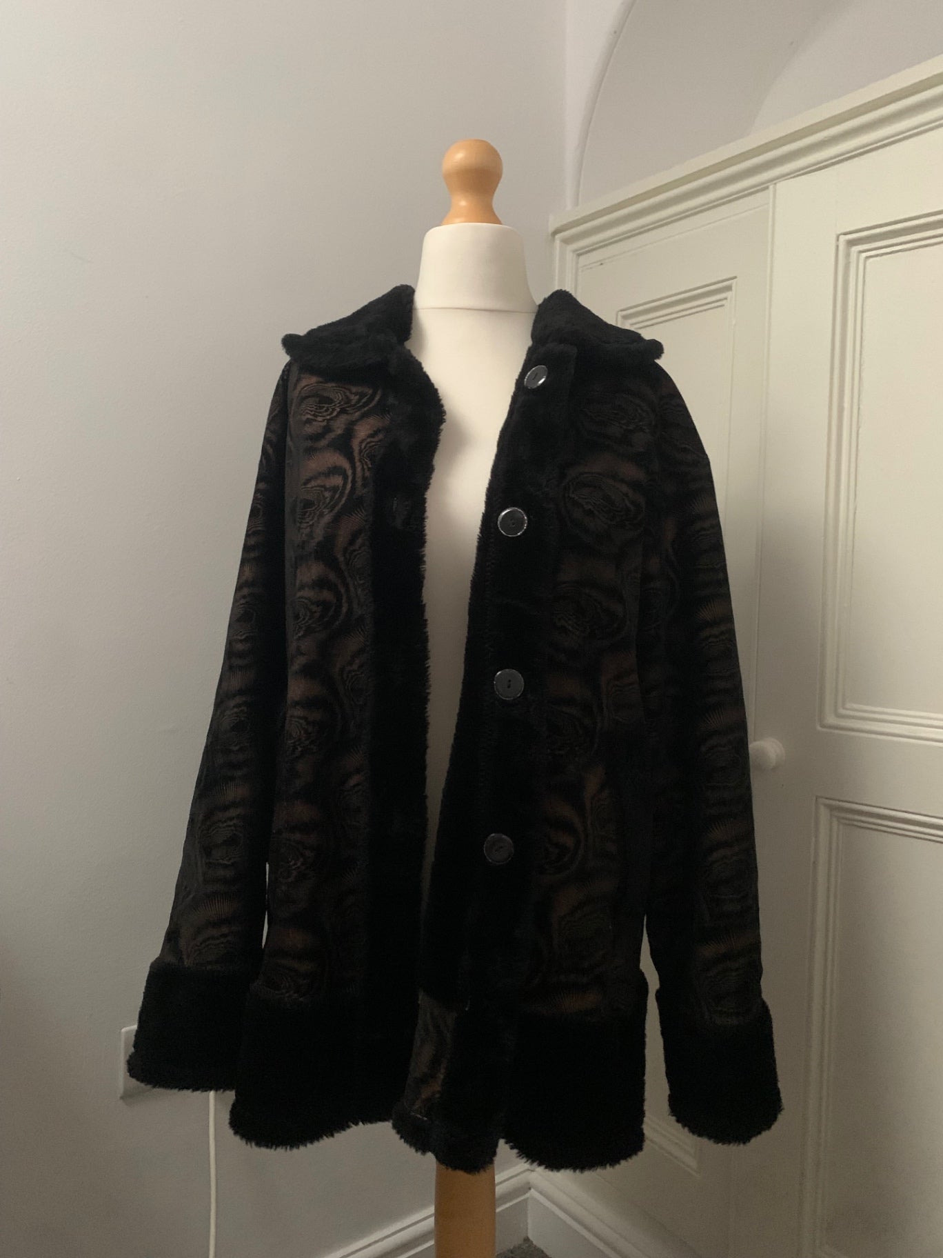 black faux fur geometric rose pattern coat