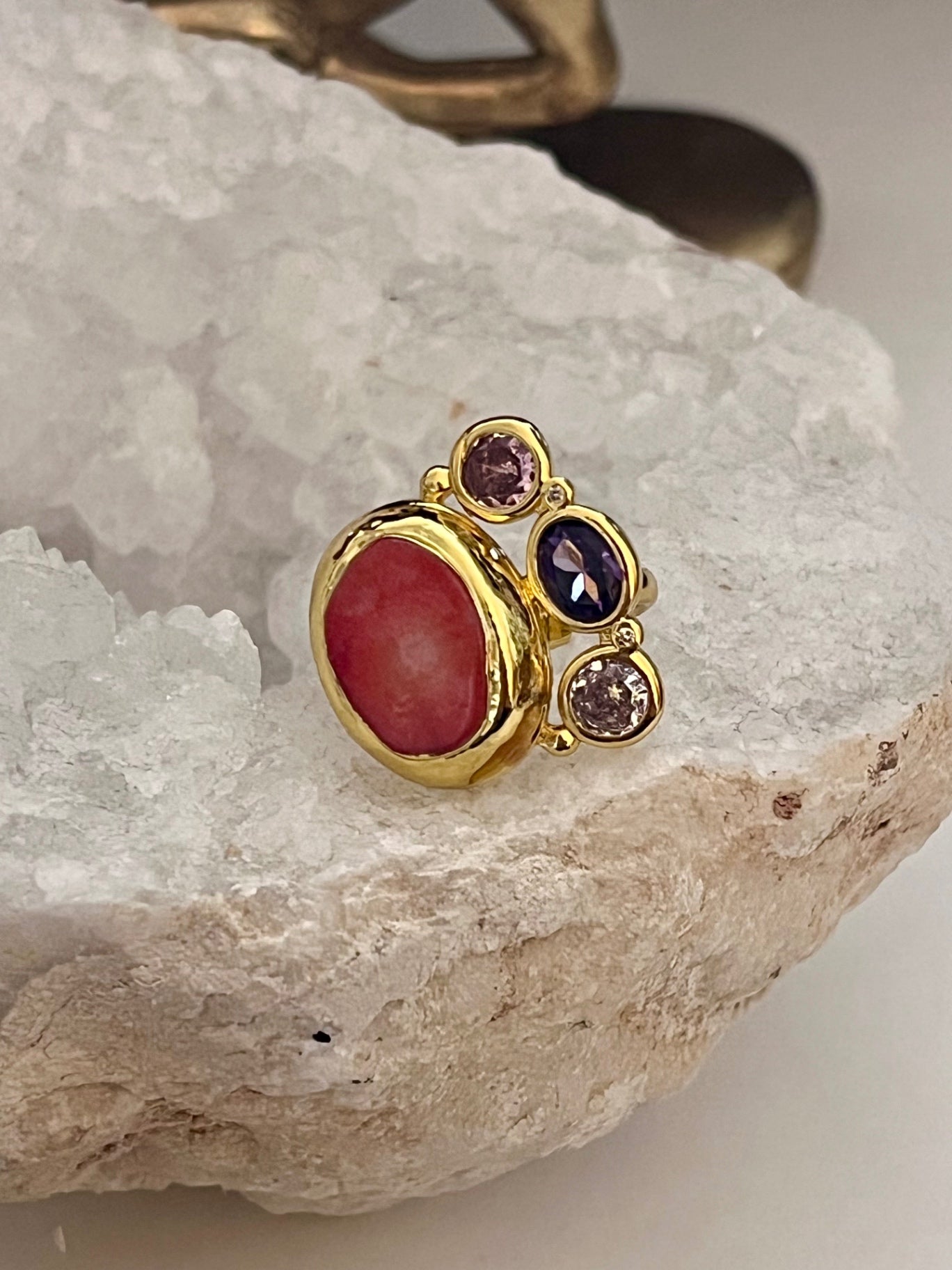 Coral and purple topaz ring