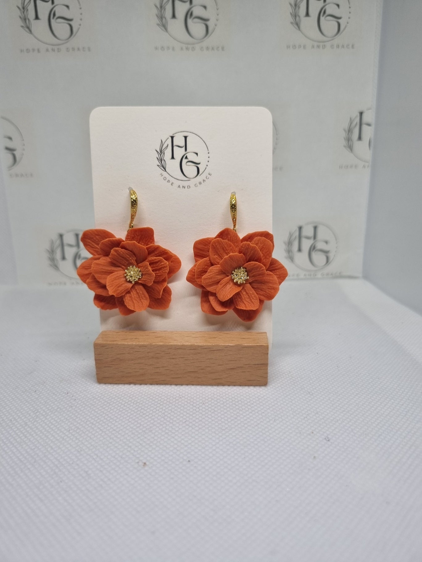 Orange statement floral earrings
