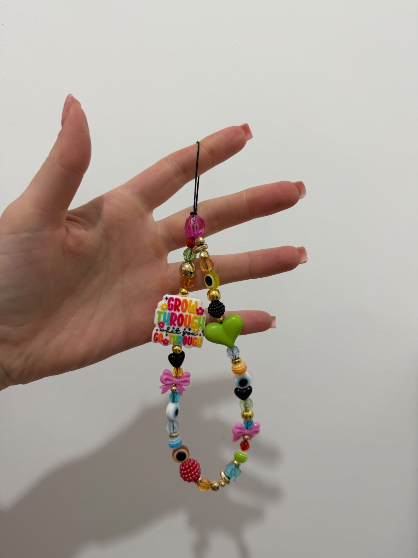 ‘Grow through’ phone charm - gold