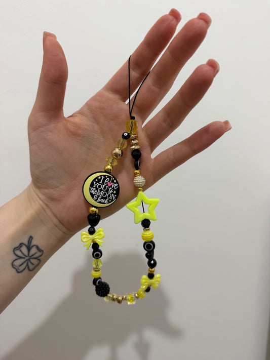 ‘To the moon and back’ phone charm - gold