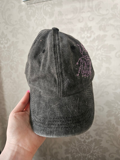 Black distressed bug cap