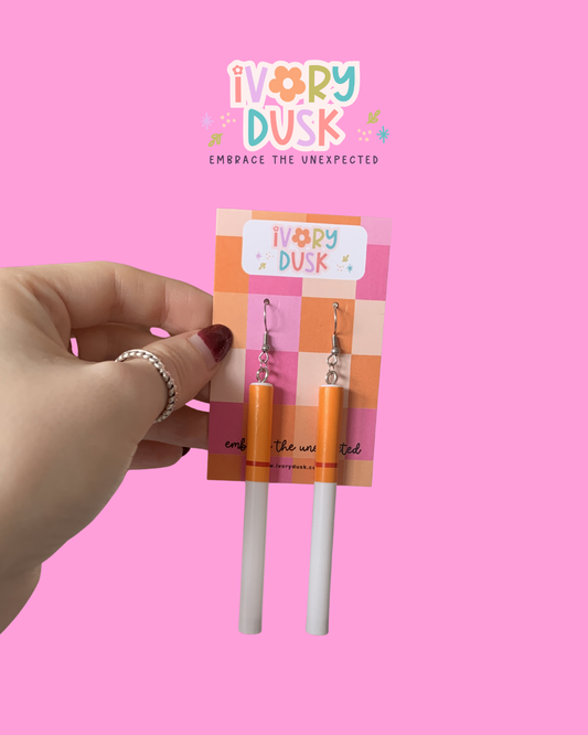 Unlit cigarette earrings