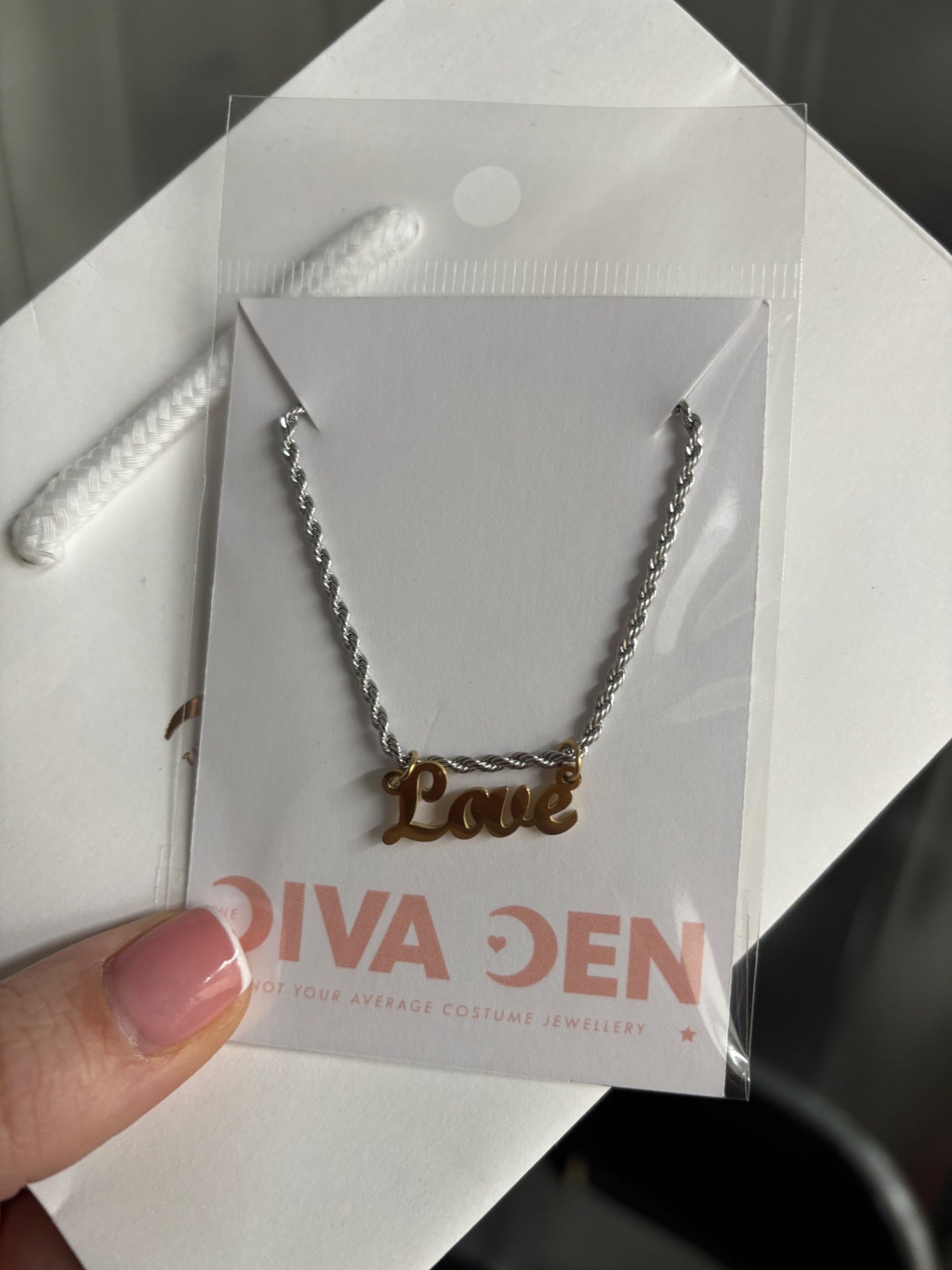 Mixed metal LOVE necklace 