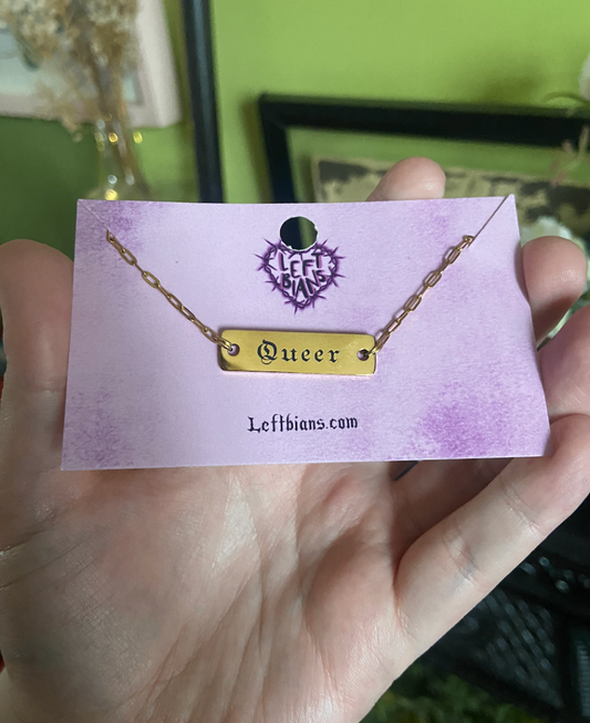 Gold queer engraved necklace 