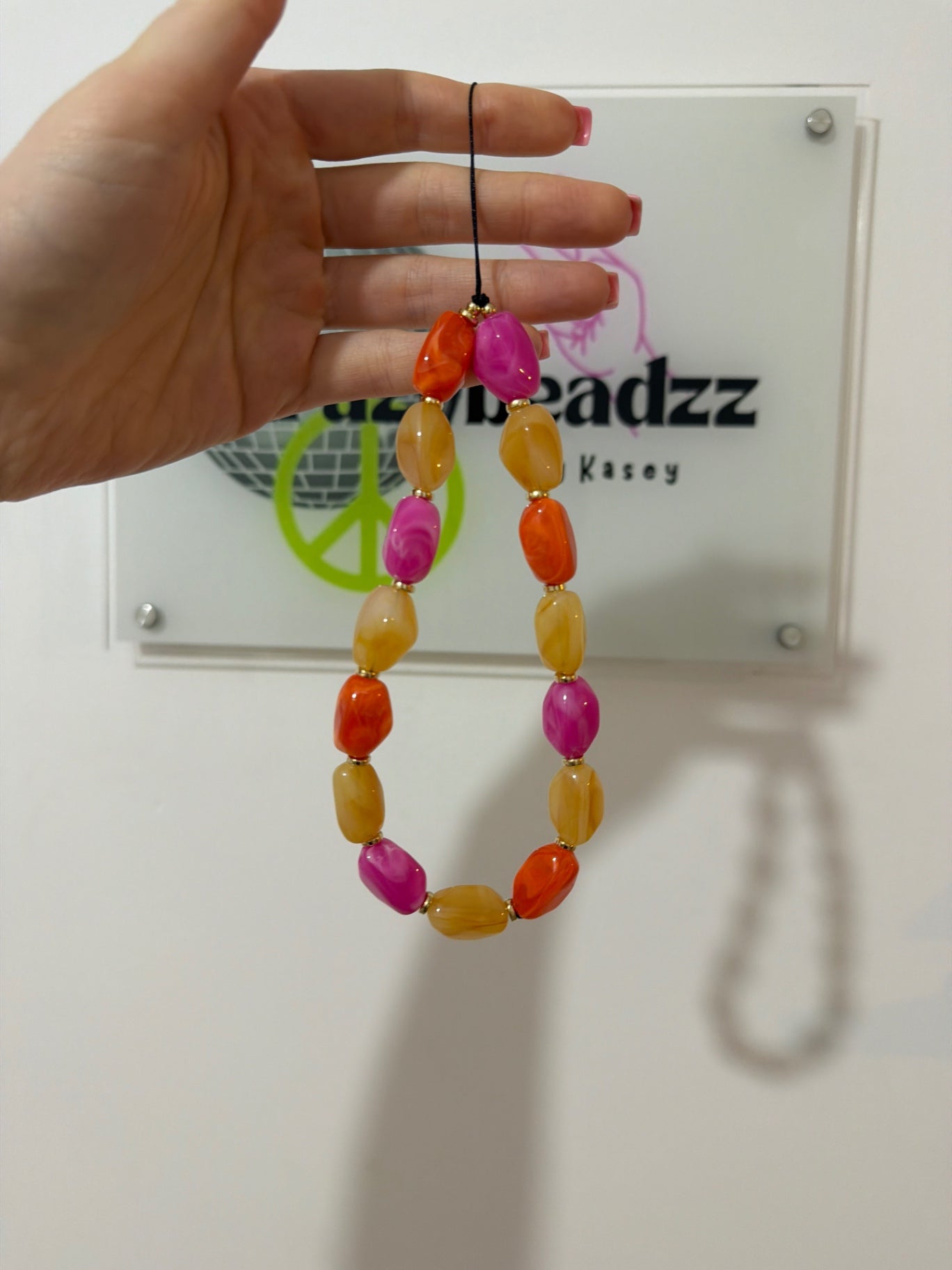 Sunset lover phone charm - gold