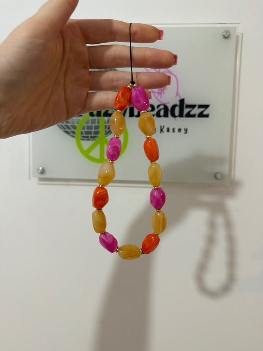 Sunset lover phone charm - gold
