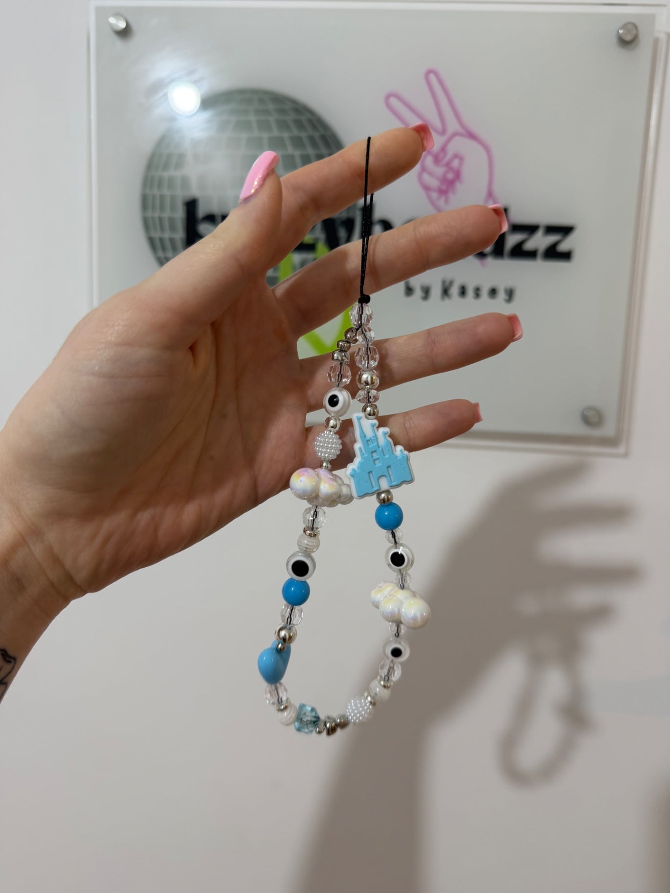 Blue ‘Disney’ phone charm - silver