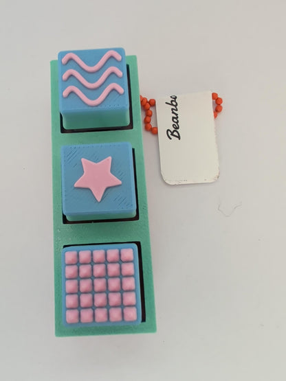Spiky Brick Clicker Keychain blue star/waves