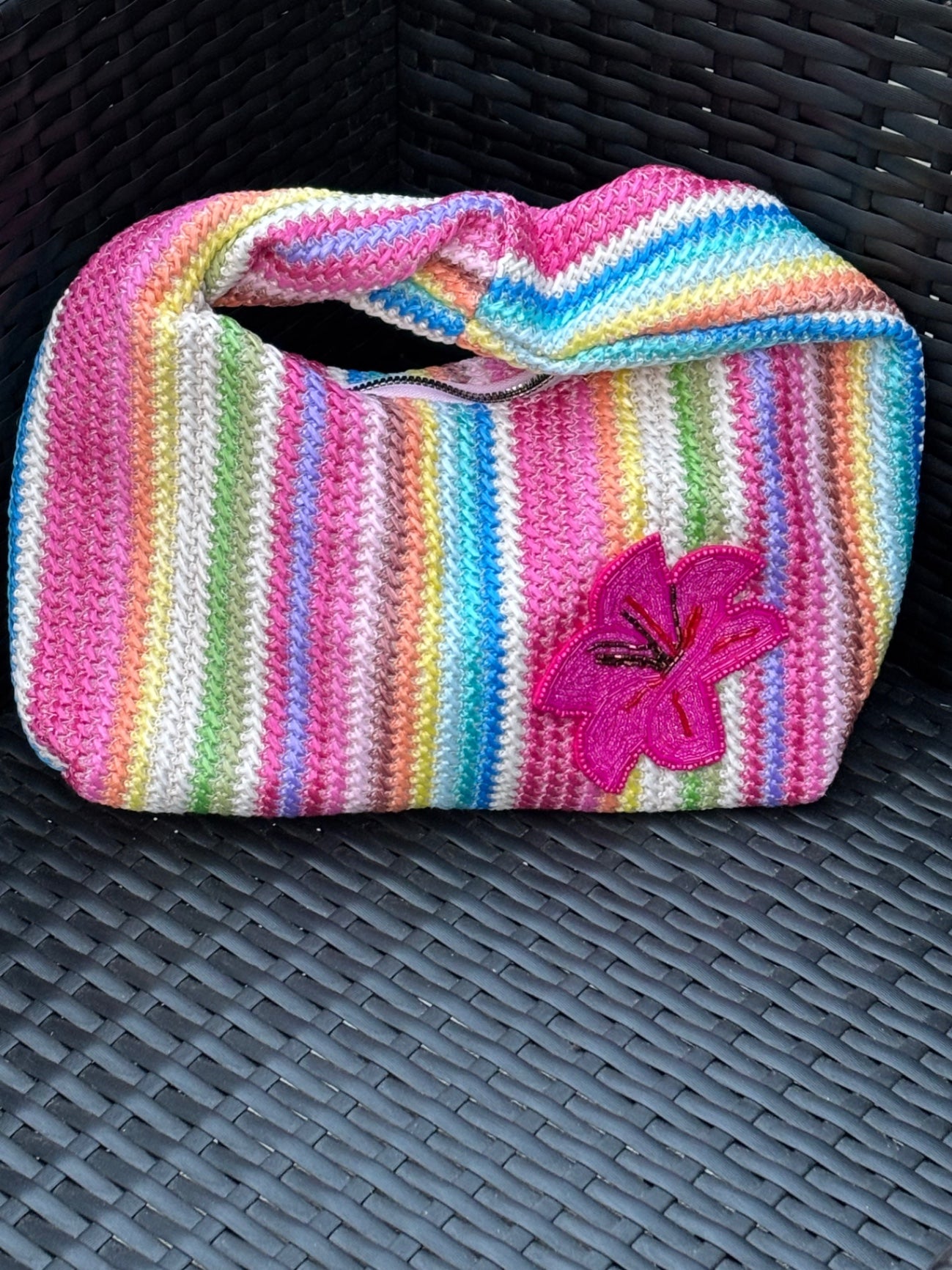 Multicoloured bag with Pink orchid patch 