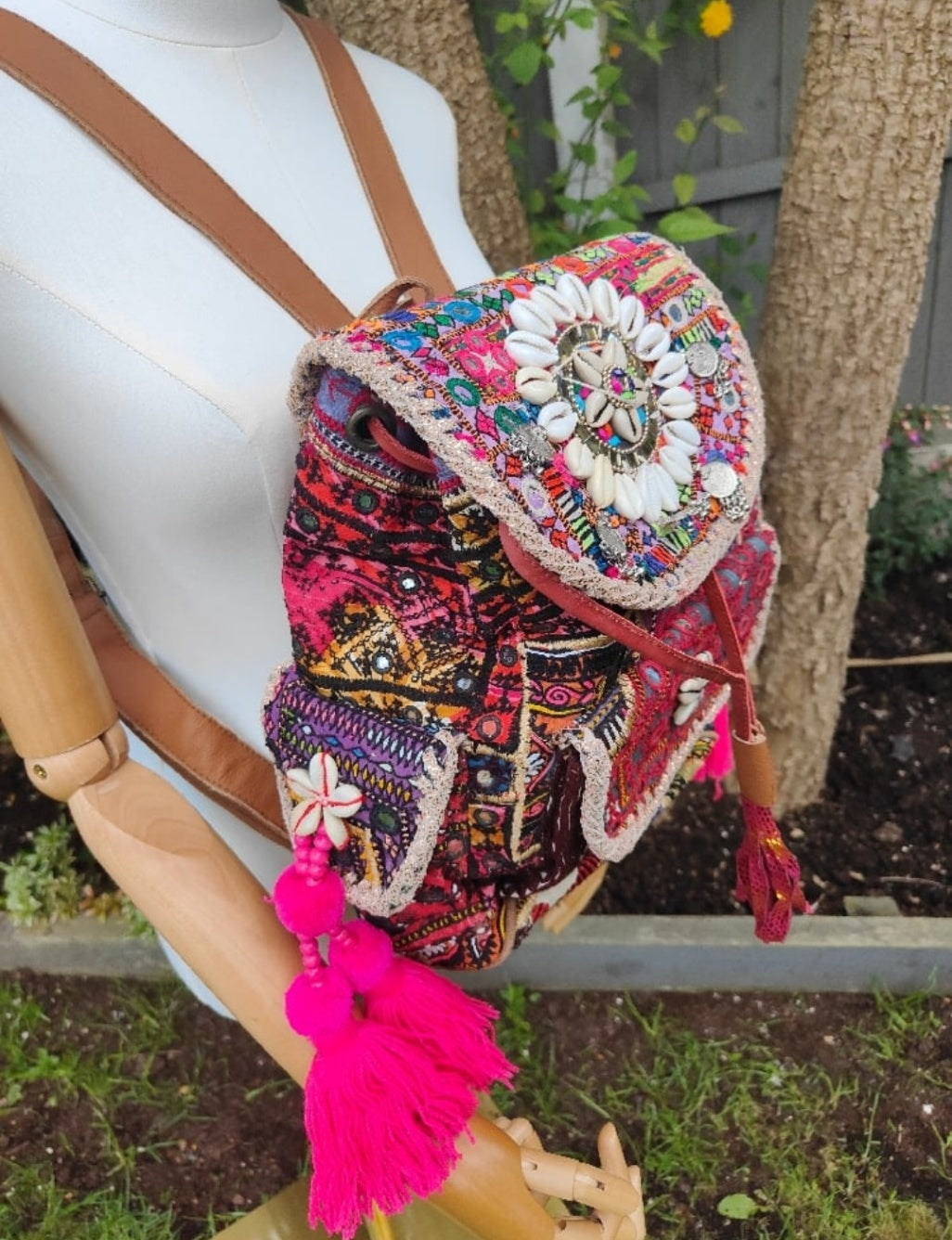 Skiathos backpack embellished with pom poms and charms