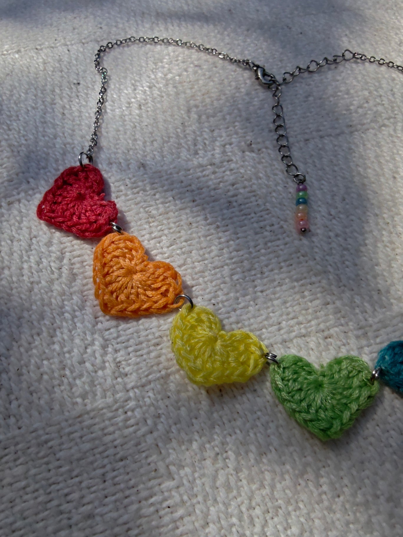 Crochet small heart necklace- pastel rainbow