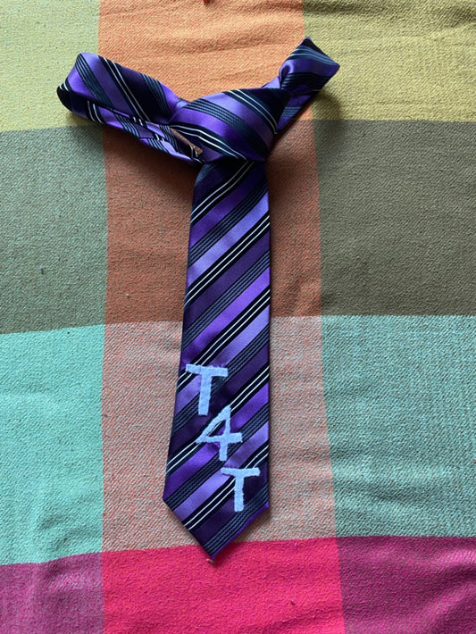 T4T Up-cycled tie with hand sewn design