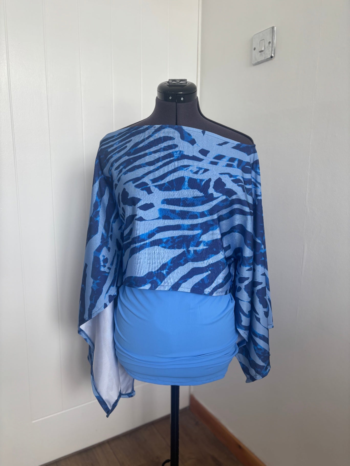 poncho top and mini skirt 