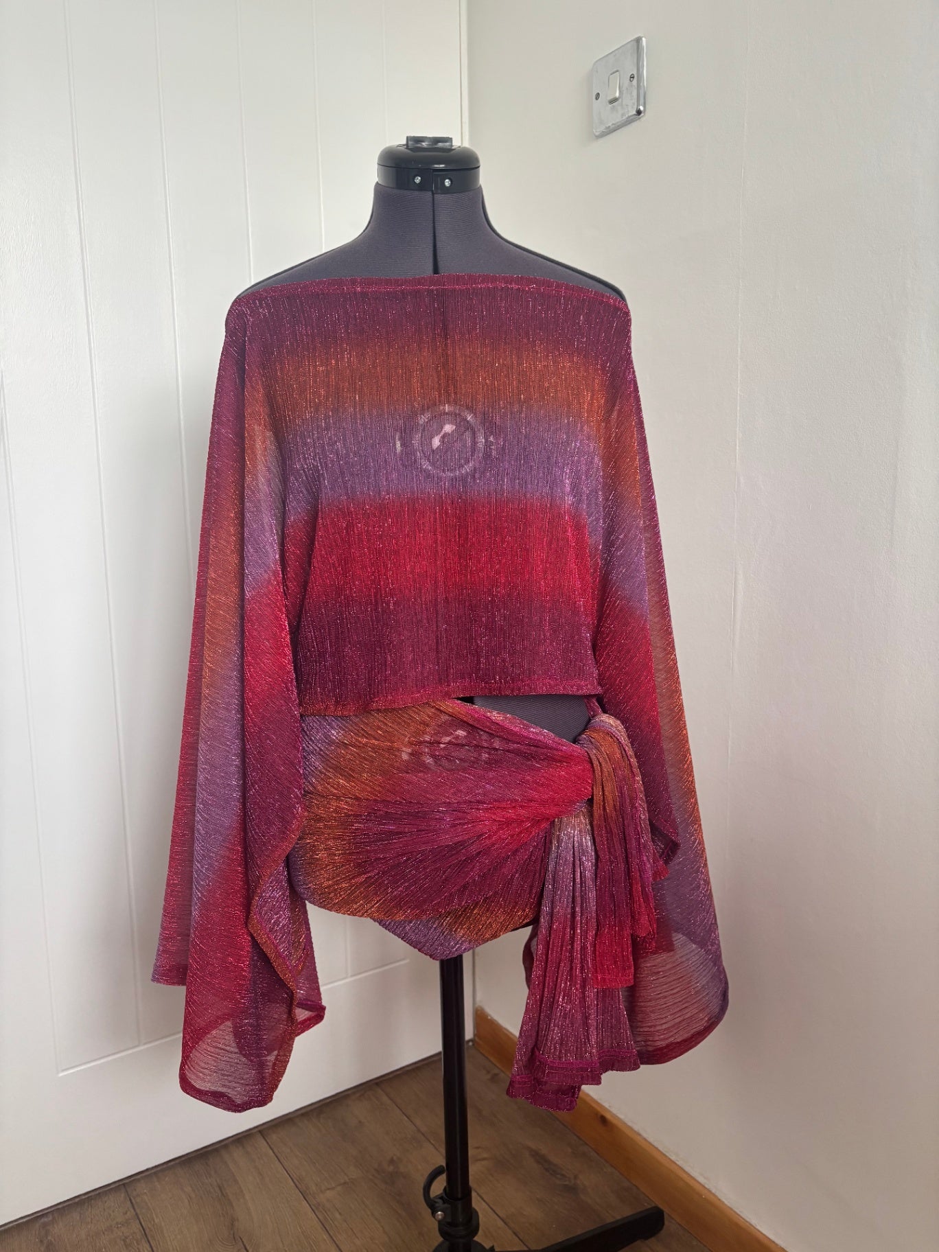 poncho top and sarong skirt