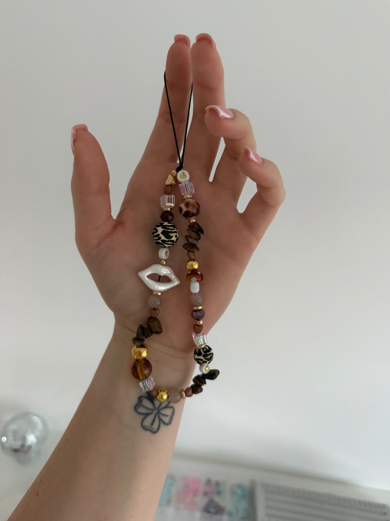 Cat eye phone charm - gold