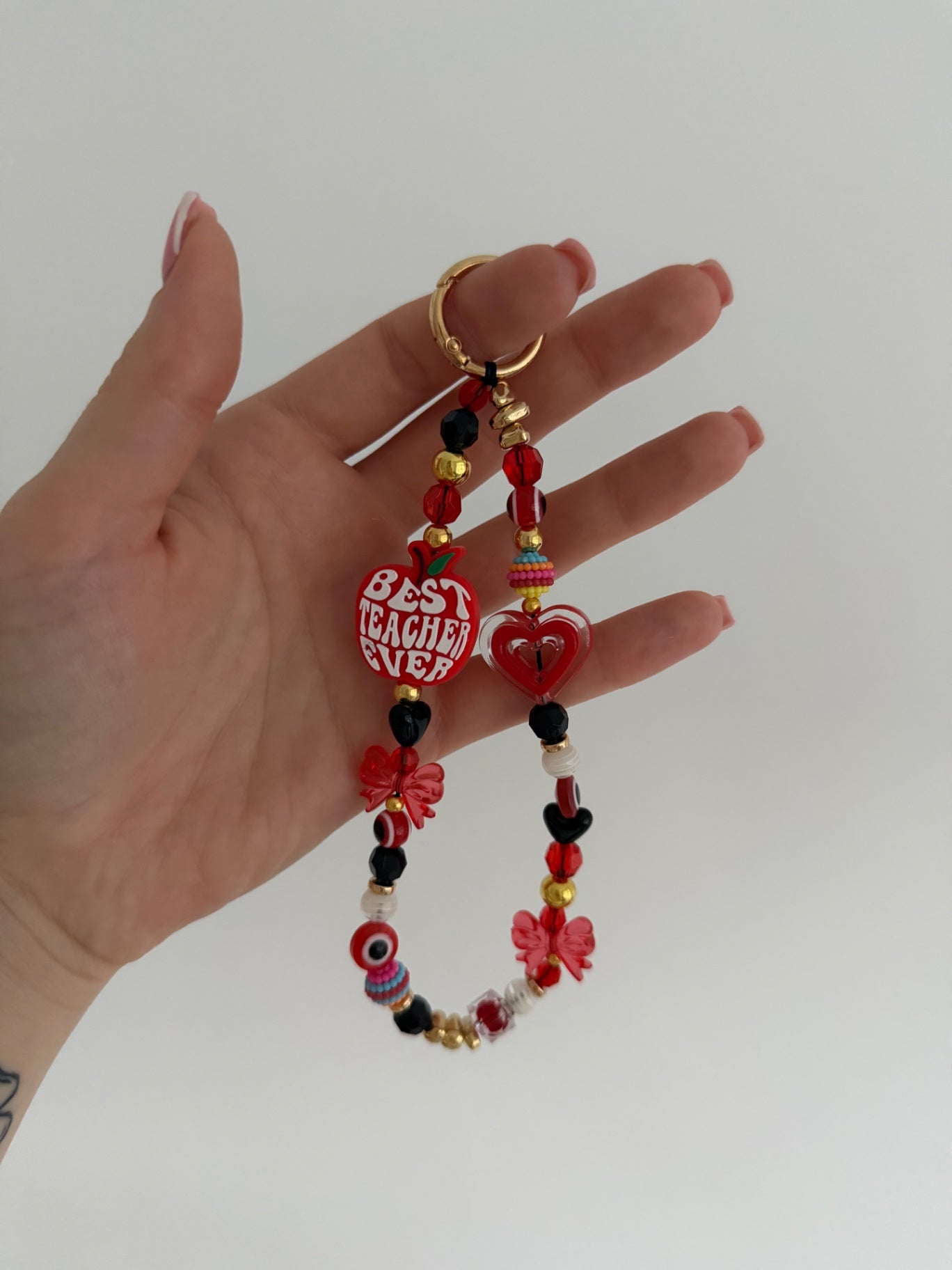 ‘Best teacher ever’ phone charm - red/gold