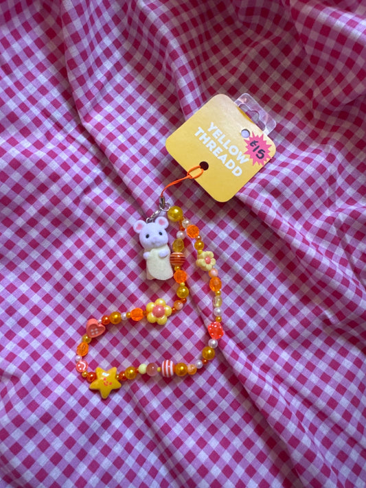 Yellow mouse orange charm 