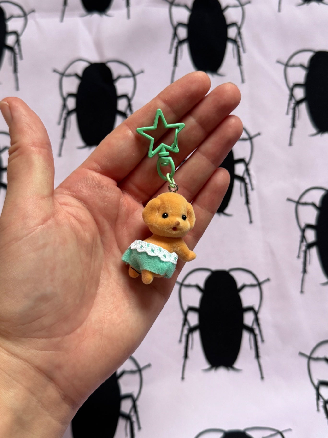 Crawling poodle keychain