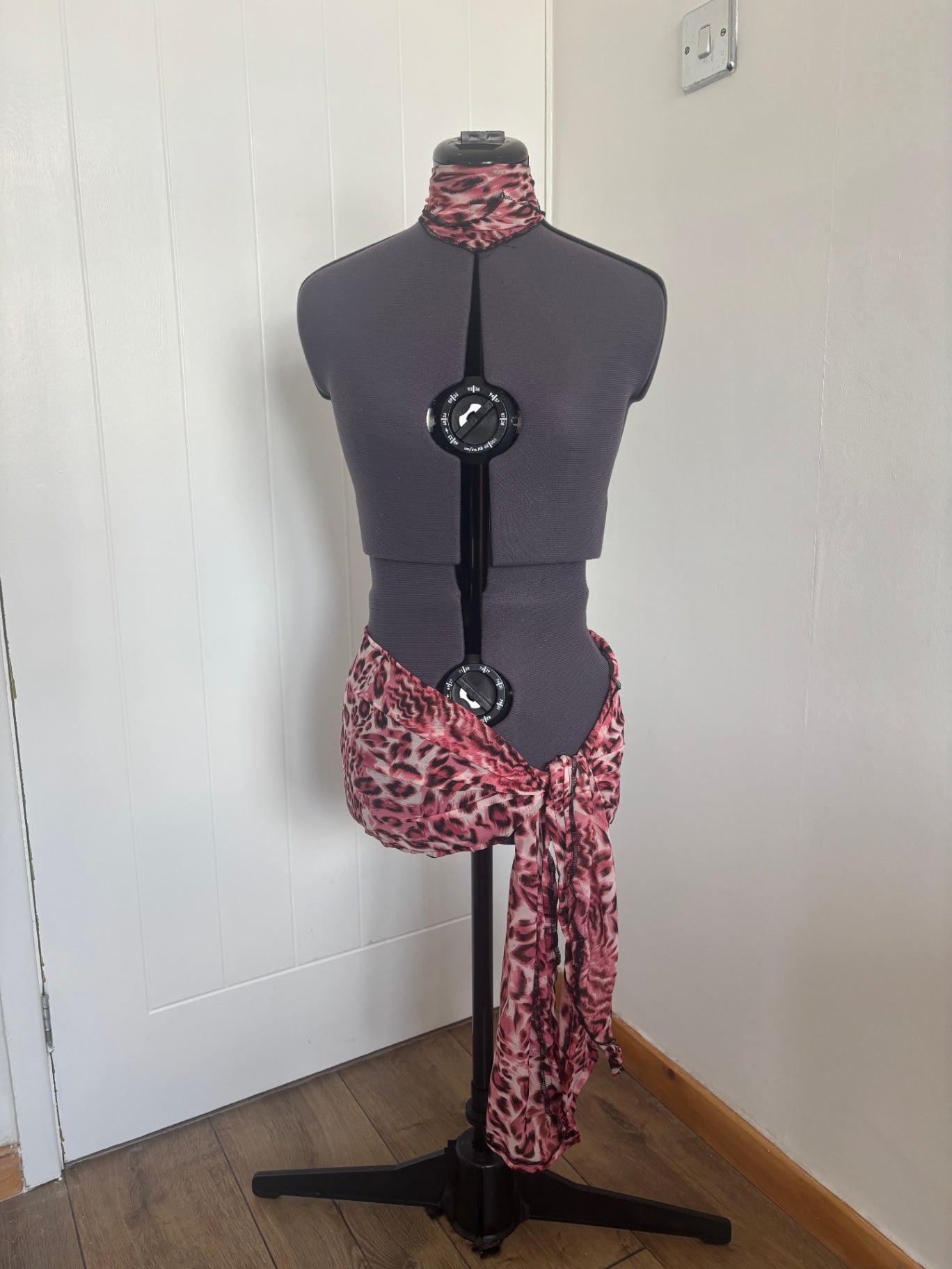 Mini sarong skirt and necktie