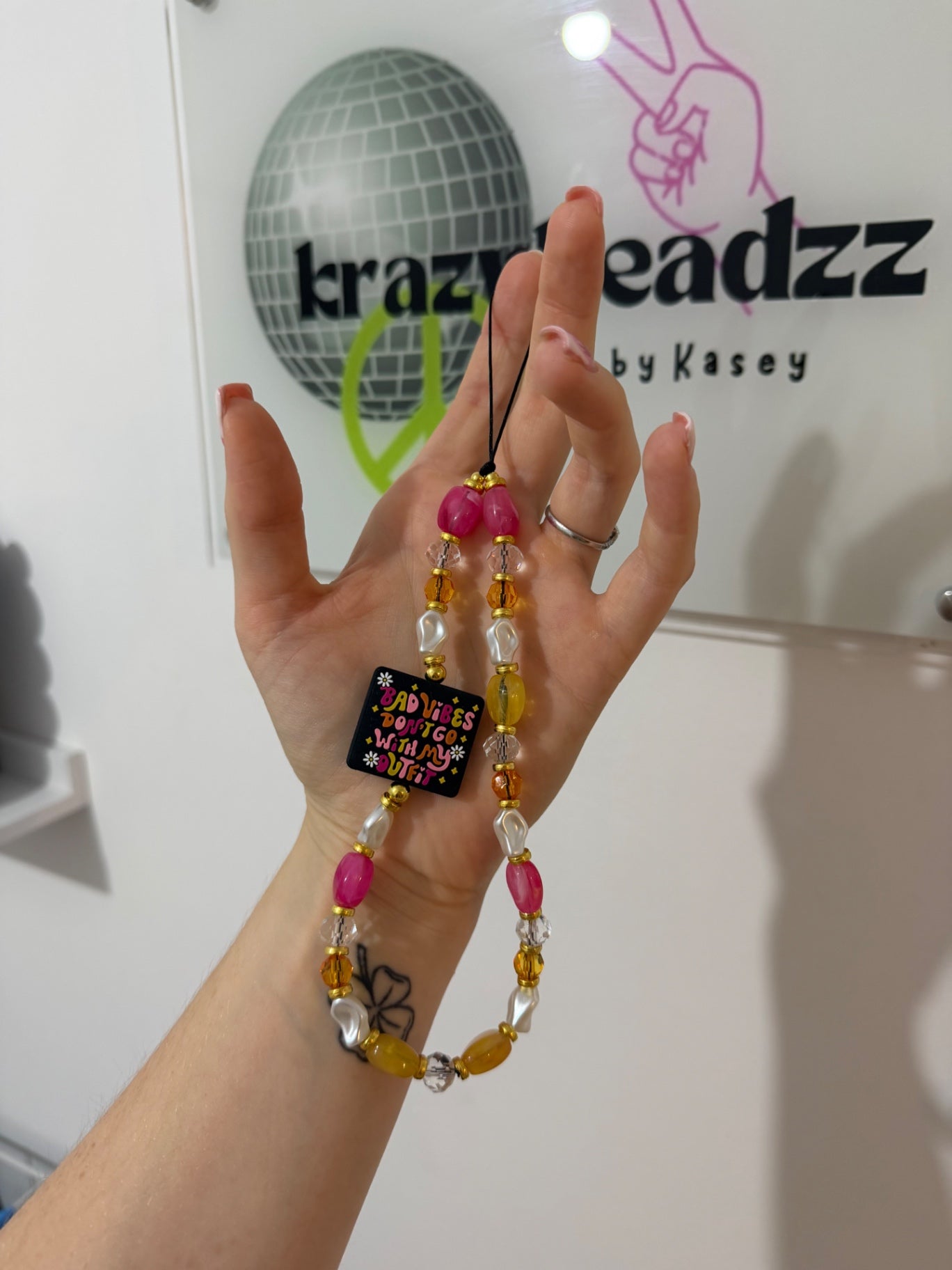 ‘Bad vibes’ phone charm 