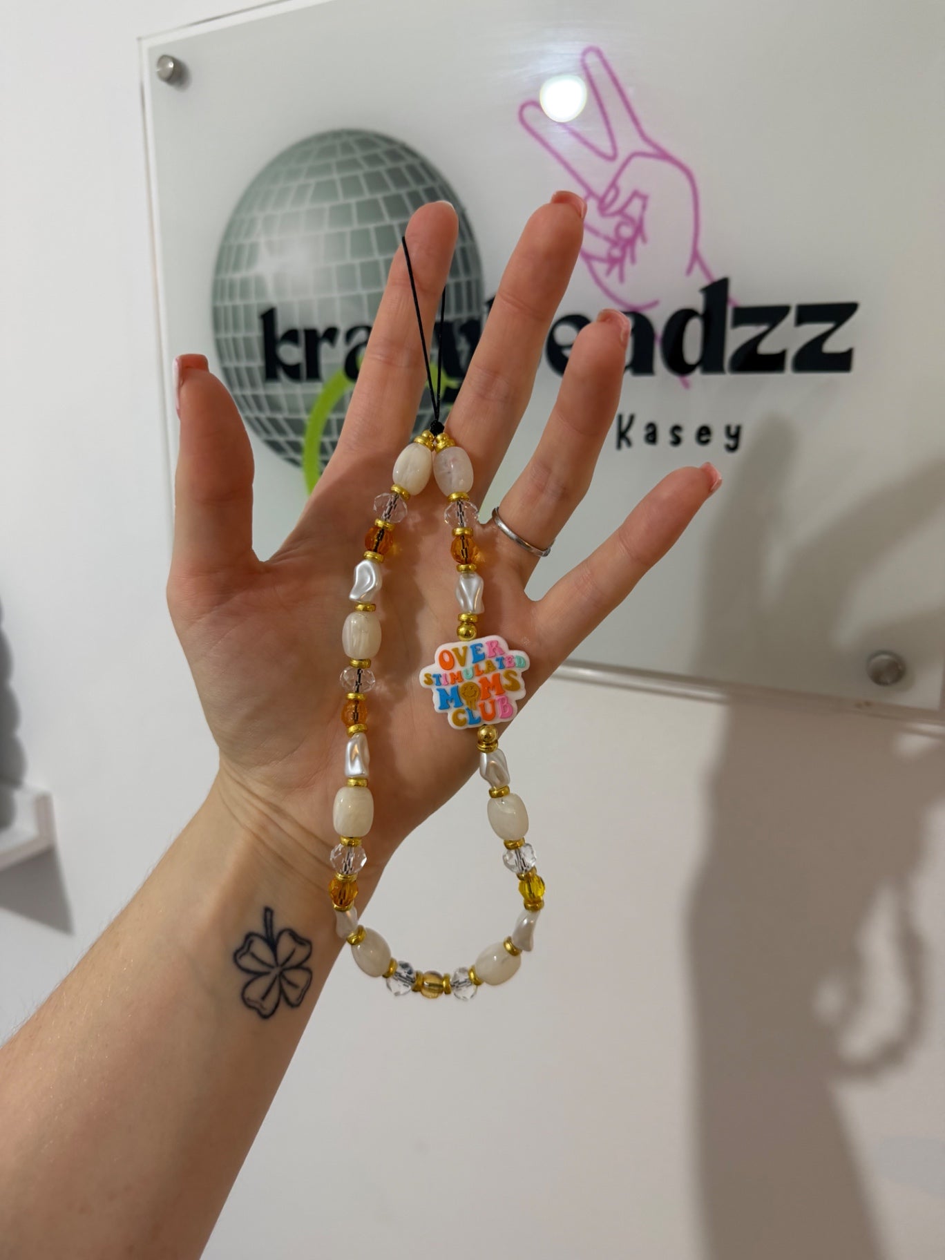 ‘Overstimulated mum club’ phone charm