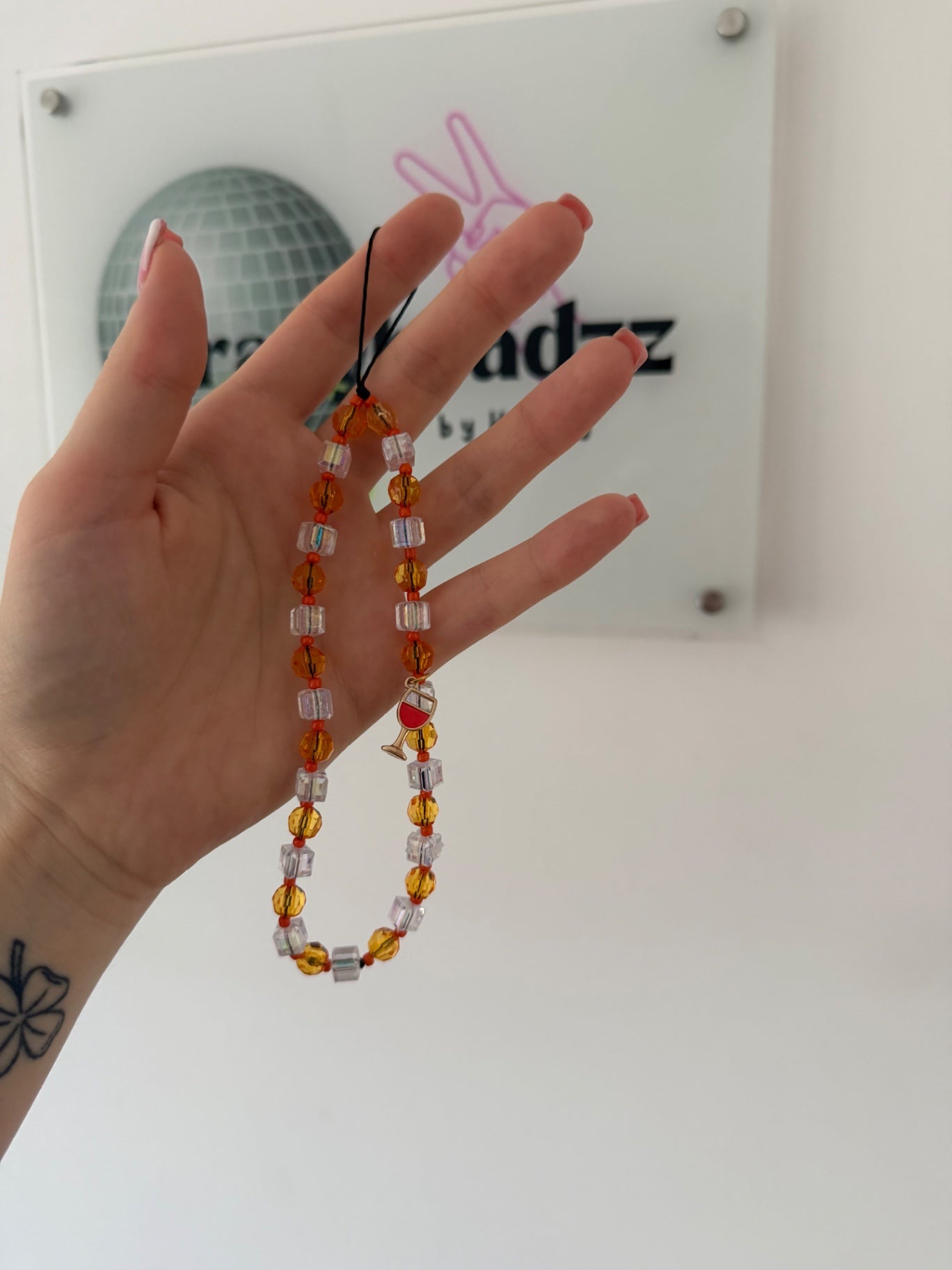 ‘Aperol obsessed’ phone charm