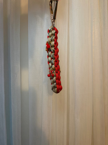 Red and beige charm keychain 