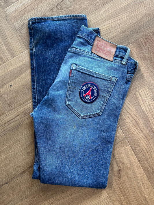 Upcycled Levi's with PSG logo.