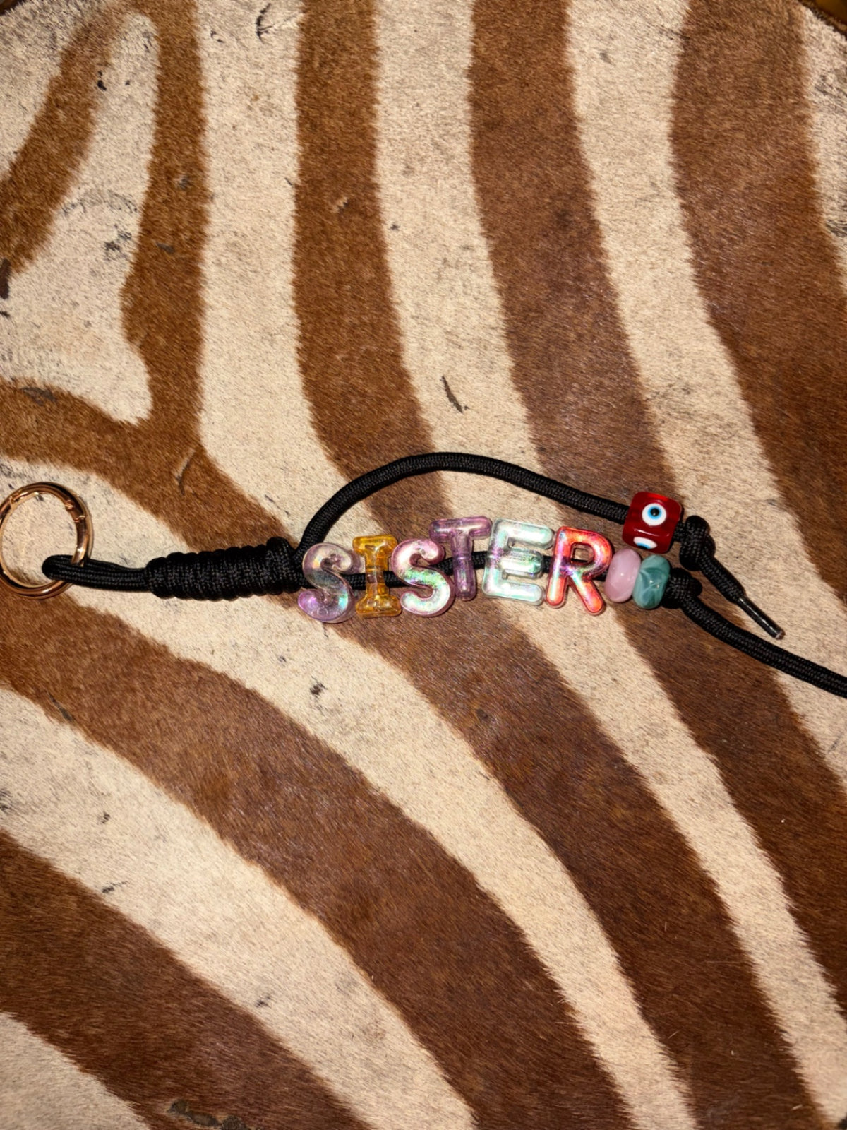 ‘Sister’ bag charm
